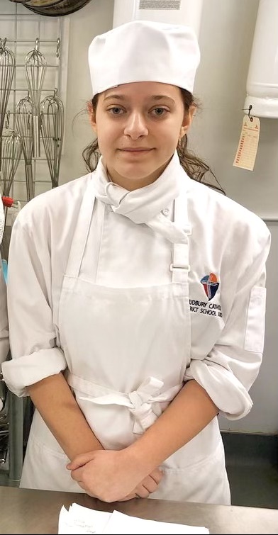 Veronica in her chef uniform